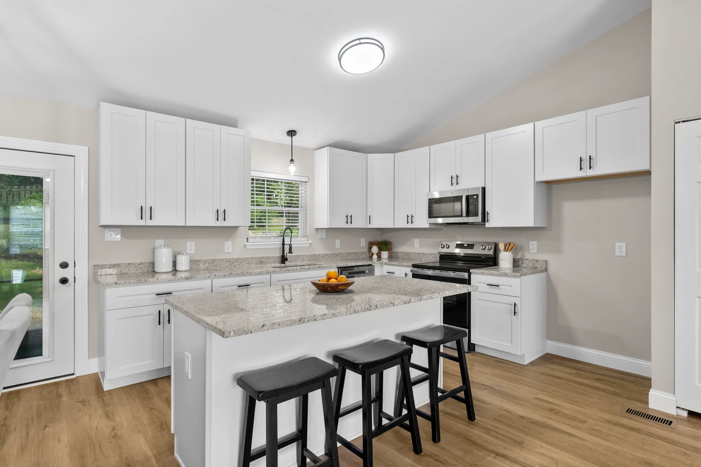 Updated kitchen with granite island at 13218 Wintergreen Estates