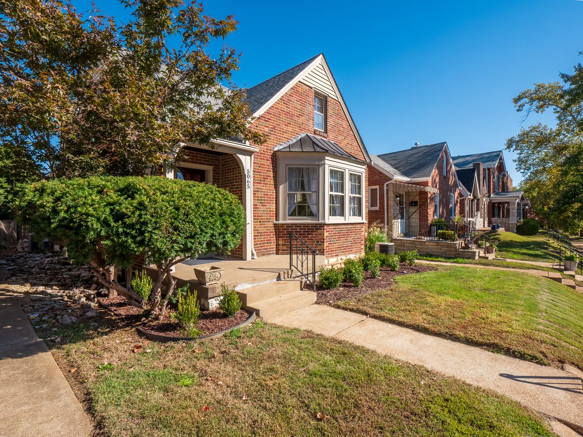Brick bungalow with a bay window on Miami Street in South City St. Louis